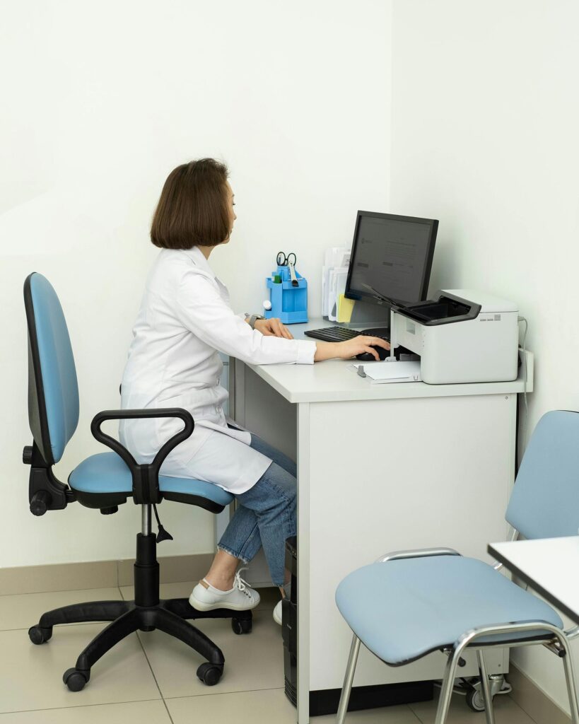 nurse completing time-consuming administrative tasks.